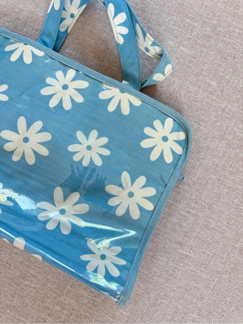 Vintage blue daisy boho vinyl clutch pouch.